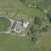 Oblique aerial view of Buittle Place Tower House, looking to the E.