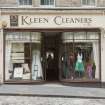 View of Kleen Cleaners shop front, 10-14 St Mary's Street, Edinburgh, from W.
