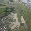 General oblique aerial view of Leuchars Airfield, looking E.