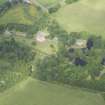 Oblique aerial view of Druminnor Castle and garden, looking to the WNW.