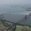 General oblique aerial view of the Forth Bridge, looking NW.