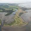 General oblique aerial view of the golf course and the fish traps in Poll na Caorach with Dornoch beyond, looking ENE.