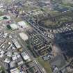 Oblique aerial view of the Glasgow Commonwealth games site including Celtic Park Stadium, looking to the ESE.