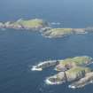 Oblique aerial view of Soraigh with Eilean Mor and Eilean Tighe, Flannan Isles, beyond, looking to the NNE.