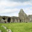 General view of the rear elevation of the east cloister range, the south transept and chancel remains, taken from the south.