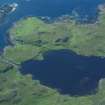 Aerial photograph of Loch na h-Airde from the NE, showing the canal, headland fort (extreme centre left) and the sheltered anchorage afforded by Sgeir Mhòr (top left). (Colin Martin)