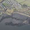 Oblique aerial view of the bay at Limekilns, looking N.