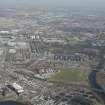Oblique aerial view of of the Glasgow Commonwealth Games site and Parkhead football stadium, looking to the E.