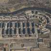Oblique aerial view of of the Glasgow Commonwealth Games site including the athlete's village, looking to the NNE.