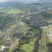 Oblique aerial view of Galashiels, Redbridge Viaduct and construction of the Hawick to Edinburgh Branch Line, looking NW.