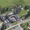 Oblique aerial view of Hoddom Castle, looking E.