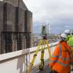 View of the Historic Scotland digital scanning team recording the fire damaged Mackintosh building from the roof of the Bourdon building.