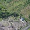 Oblique aerial view of Auchinvole Castle, looking ESE.