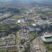 Oblique aerial view of the Commonwealth Games Village, Celtic Park and Emirates Arena, looking SW.