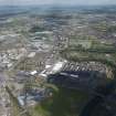 Oblique aerial view of the Commonwealth Games Village, Celtic Park and Emirates Arena, looking NNE.