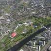 Oblique aerial view of Radio 1's Big Weekend at Glasgow Green, Nelson Monument and People's Palace, looking ENE.