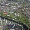Oblique aerial view of Radio 1's Big Weekend at Glasgow Green, Nelson Monument and People's Palace, looking N.