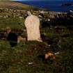 Ness shepherds gravestone, west face, and possible unmarked grave markers. 10 May 2005.