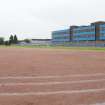 Main Block. General view from South East showing playing fields.