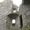 Invermark Castle. View of windows at 3rd floor level on east face and opening to turret at south east corner