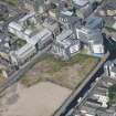 General oblique aerial view of Fountainbridge, Union Canal, Lochrin Basin and Edinburgh Quay, looking NNE.