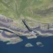 Oblique aerial view of Clamshell Cave and the jetty, Staffa, looking NNW.