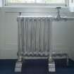 1st floor, south east bedroom dressing room, detail of radiator