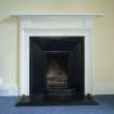 1st floor, south east bedroom dressing room, detail of fireplace