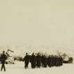 View of soldiers marching behind a piper at Stobs Camp. 
