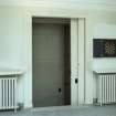 Cowdray Hall, 1st floor, landing to south of auditorium, view of sliding doors (open) to Memorial Court