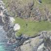 Oblique aerial view of Dun Beag Vaul on Tiree, looking S.