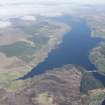 General oblique aerial view of Loch Shin centred on Lairg power station and dam, looking NW.