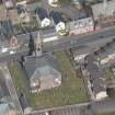 Oblique aerial view of Loudoun Old Parish Church and Newmilns Churchyard, looking N.