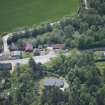 Oblique aerial view of Finzean Sawmill and Turning Mill, looking SE.