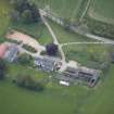 Oblique aerial view of Colquhonnie Hotel and Colquhonnie Castle, looking S.