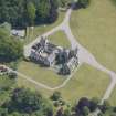 Oblique aerial view of Ballindalloch Castle, looking E.