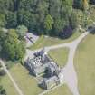 Oblique aerial view of Ballindalloch Castle, looking NE.