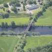 Oblique aerial view of Ballindalloch railway bridge, looking S.