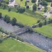 Oblique aerial view of Ballindalloch railway bridge, looking SE.
