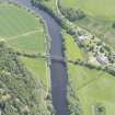 Oblique aerial view of Ballindalloch railway bridge, looking ESE.