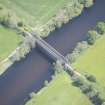 Oblique aerial view of Ballindalloch railway bridge, looking ENE.