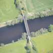 Oblique aerial view of Ballindalloch railway bridge, looking NE.