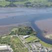 Oblique aerial view of Dumbarton Castle, Strathclyde Homes Stadium and Lang Dyke sea defences, looking SSW.