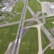 Oblique aerial view of Aberdeen Airport, looking SSE.