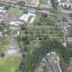Oblique aerial view of Daniel Stewarts and Melville College,  Dean Gallery, Bristo Baptist Church, Dean Parish Church, Dean House and Dean Cemetery Extension, looking N.
