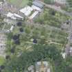Oblique aerial view of Daniel Stewarts and Melville College,  Dean Gallery, Bristo Baptist Church, Dean Parish Church, Dean House and Dean Cemetery Extension, looking NW.