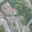 Oblique aerial view of Dean Village, Damside, Dean Path, Dean Bridge, Rothesay Terrace, Belgrave Terrace, Holy Trinity Espicopal Church and Drumsheugh Baths, looking NW.