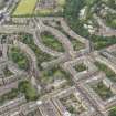 Oblique aerial view of the Western New Town, Palmerston Place, Walpole Hall, Easter Coates House and St Mary's Episcopal Church, looking SSW.