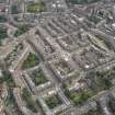 Oblique aerial view of Melville Street, Palmerston Place, Atholl Crescent, Coates Crescent and Shandwick Place, looking E.