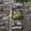 Oblique aerial view of the Scottish National Portrait Gallery, Princes Street and St Andrew Square, looking SSE.